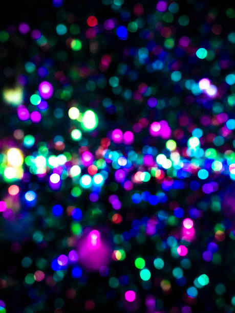 istock Colorful glitter particles defocused background 1057012206