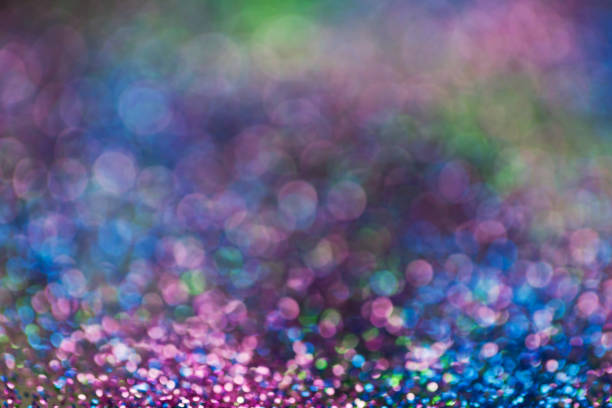 istock Blurry background, Colorful glitter sparkles 1057013582