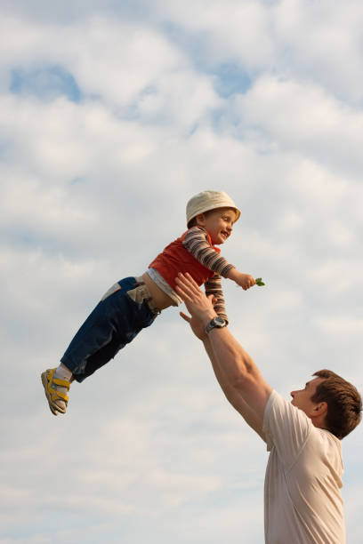 istock Happy family playing outdoors 105703829