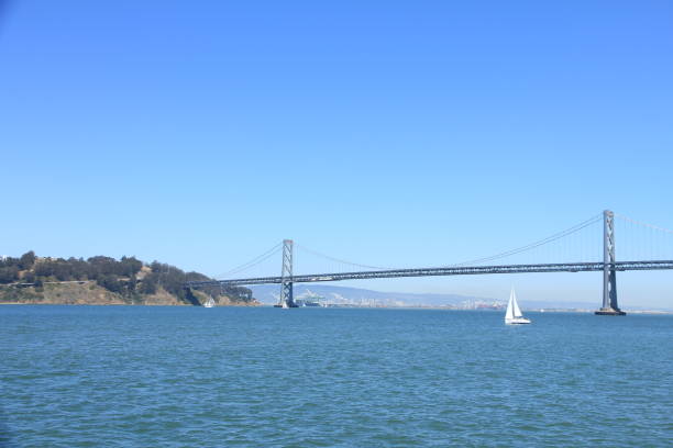 istock Sailing across the Bay Bridge in San Francisco 1057055034