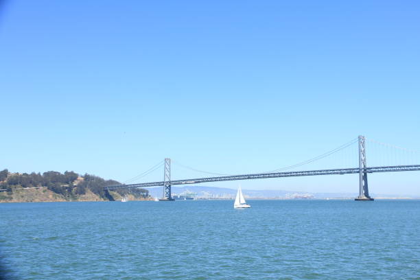 istock Sailing across the Bay Bridge in San Francisco 1057055052