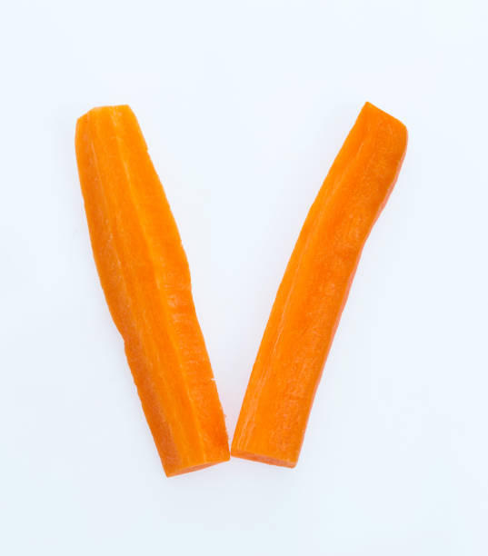 Letter V made with red carrot sticks