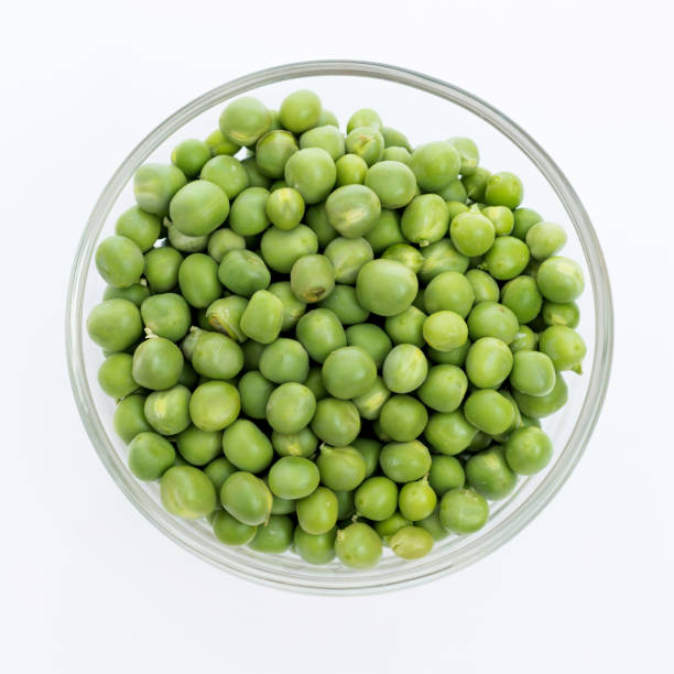 istock Fresh green peas in a bowl 1057056332