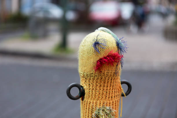 istock Woolen hat on a street pole 1057058284