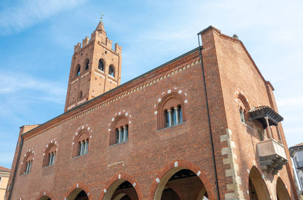 Monza, Italy, the ancient Arengario palace, former City Hall, with the Cathedral bell tower in the background