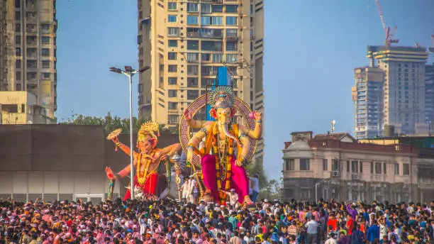 Hindus celebrate Ganesh Chaturthi for 10 days, and on the the 11th day of this festival is Ganesh Visarjan. The statue is to be immersed in a river or the sea symbolizing a ritual see-off of the Lord in his journey towards his abode in Kailash while taking away with him the misfortunes of his devotees. In Mumbai at Gigaon Chowpaty one can experience the largest gathering of people in the town.