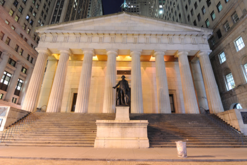 Federal Hall at night, the first capitol of the United States of America and site of George Washington's presidential inauguration, in the Financial District of New York City.