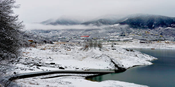 istock Snowy lake landscape 1057063148
