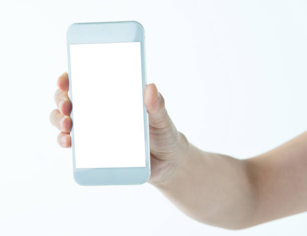 istock Woman hand holding smart phone on white background 1057065254
