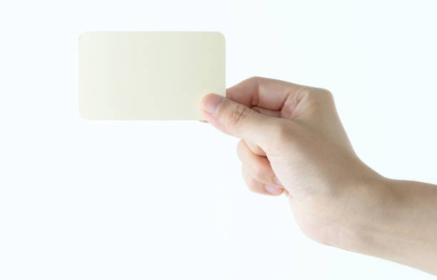 istock Woman hand holding a empty card on white background 1057065336