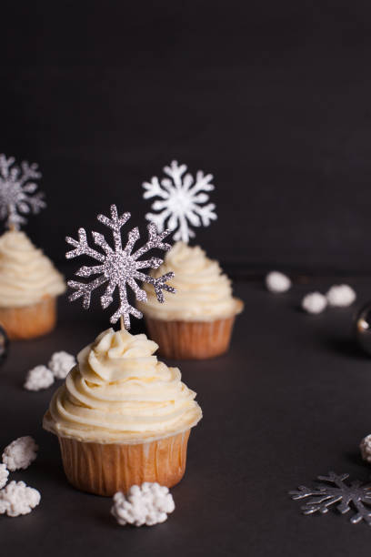 istock Christmas cupcake decorated with shining snowflakes 1057065396