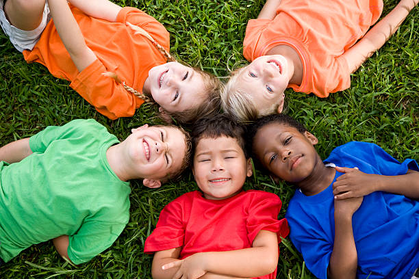 istock Diverse group of children representing unity, friendship, teamwork, community, hope 105706678