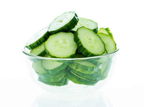 Fresh cucumber slices in a bowl. Fresh cucumber slices in a bowl. cucumber slice stock pictures, royalty-free photos & images