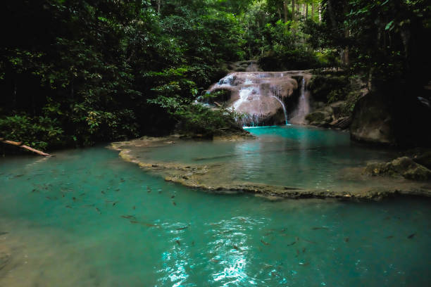 istock Deep forest waterfall in erawan national park kanchanaburi 1057071444