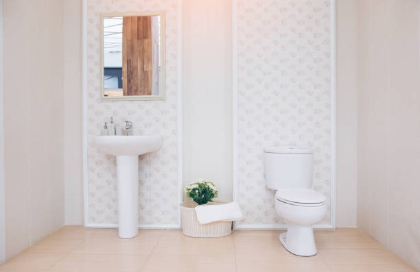 istock View of a spacious and elegant bathroom. Modern spacious bathroom with bright tiles with toilet and sink. 1057071748