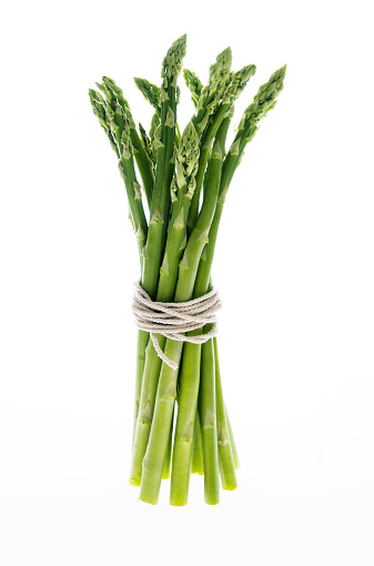 A bundle of asparagus on white background.