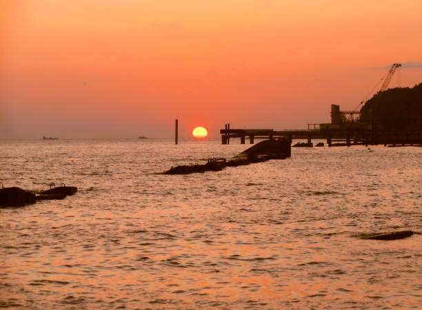 istock Sunset over summer sea with a small waves 1057076368