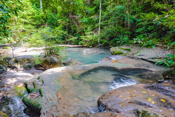 istock Deep forest waterfall in erawan national park kanchanaburi 1057080722
