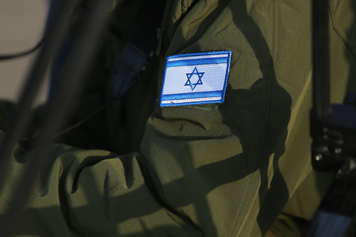 Details with the Israeli flag on a military medic uniform
