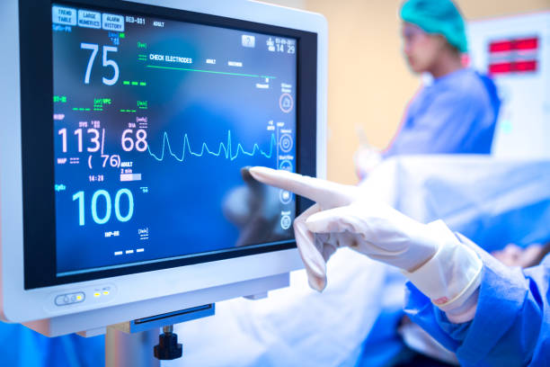 istock Female surgeon using monitor in operating room. 1057097950