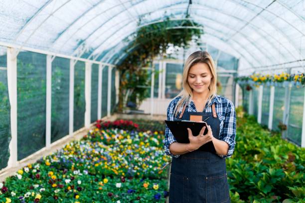 istock Woman working at a garden center 1057100752