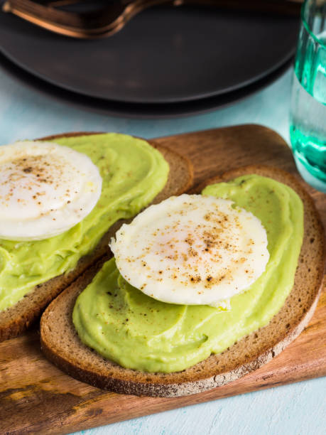 Rye bread avocado toasts with poached egg
