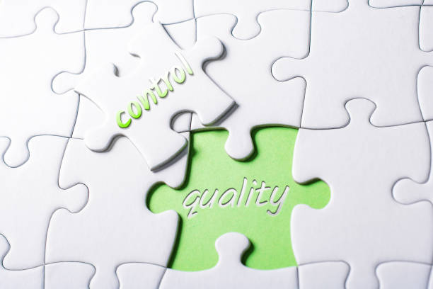 istock The Words Quality And Control In Missing Piece Jigsaw Puzzle 1057108628