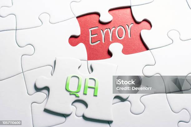The Words Qa And Error In Missing Piece Jigsaw Puzzle Stock Photo - Download Image Now