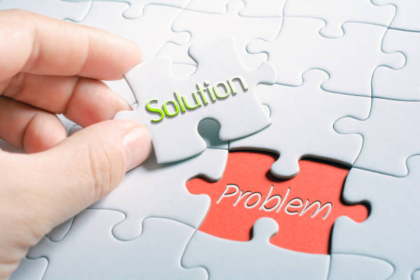 The Words Solution And Problem In Missing Piece Jigsaw Puzzle stock photo