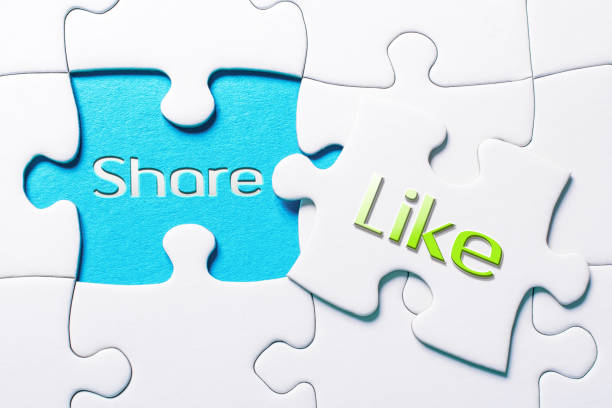 istock The Social Media Words Share And Like In Missing Piece Jigsaw Puzzle 1057111504