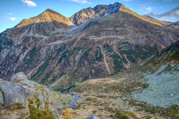 istock Swiss Mountain in fall with all colours 1057115614