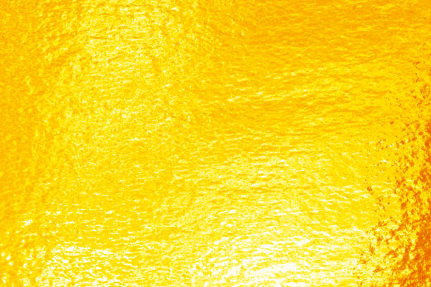 istock Shiny yellow leaf gold foi 1057115884