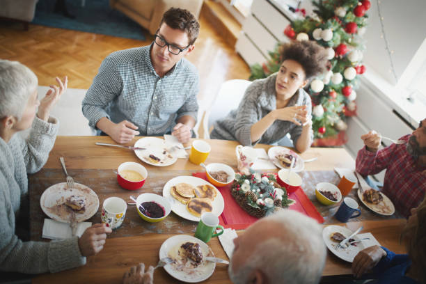 istock Family having breakfast on Christmas morning. 1057116252