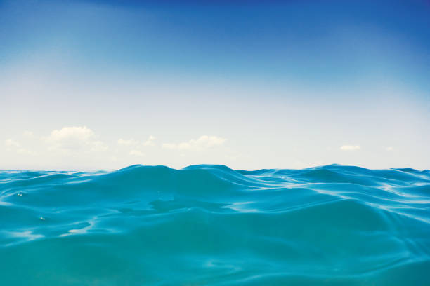 istock Sea wave close up, low angle view water background 1057120316