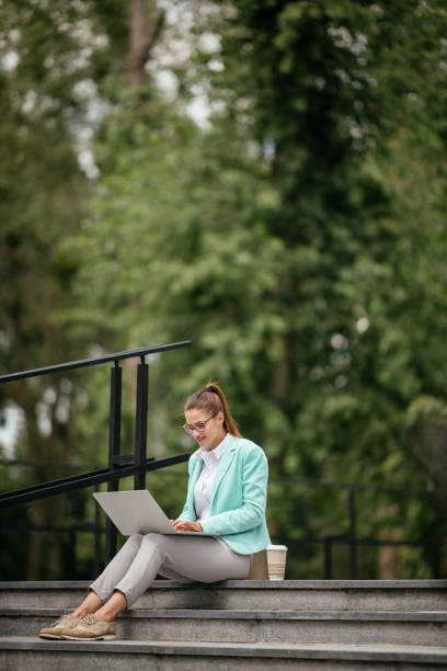 istock Young businesswoman working on a coffee break 1057123248