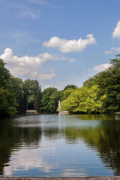 istock Beautiful park scene in public park 1057129730