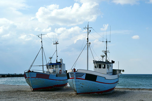 coast in denmark, national park thy, two ships at the beach of Vorupoer
