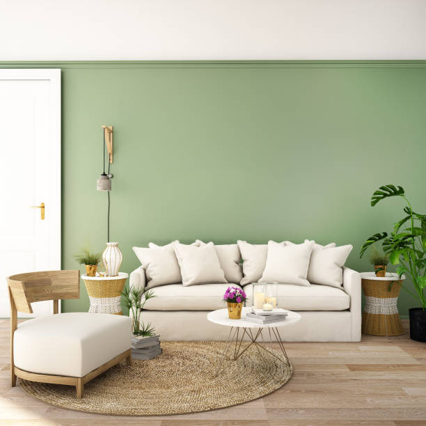 istock interior design for living area or reception with sofa,plant,sidetable,props on wood floor and white and deep green in Scandinavian style background  / 3d illustration,3d rendering 1057132914