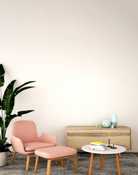 istock 3d rendering,3d illustration,interior design for living area or reception in modern style with armchair, table,plant on wood floor and pink wall 1057132984