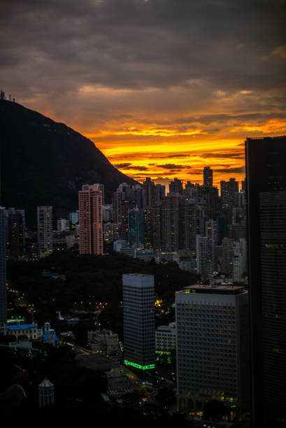 istock Hong Kong skyline at sunset before the typhoon - 1 1057134262