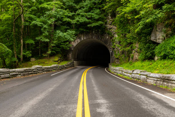 Mountain Highway Tunnel A tunnel on a highway in the Smoky Mountains. newfound gap stock pictures, royalty-free photos & images