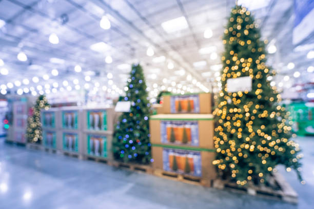 istock Filtered tone blurred huge Christmas tree decoration at wholesale hypermarket 1057138588