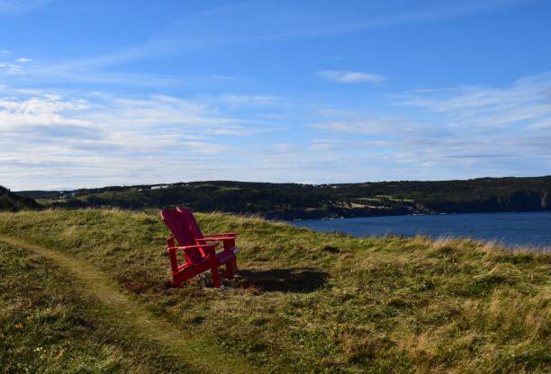 istock Adirondack chairs on the Newfoundland shoreline 1057143272