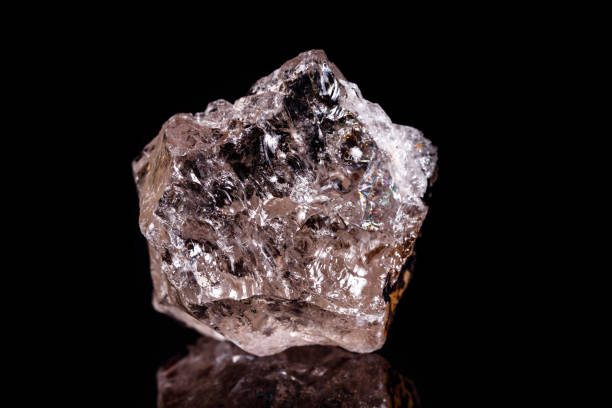 istock Macro mineral stone smoky quartz Rauch topaz on black background 1057143748