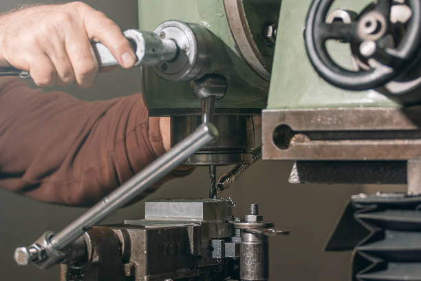 istock Employee drilling. Metal drilling. Metal workshop. 1057146452