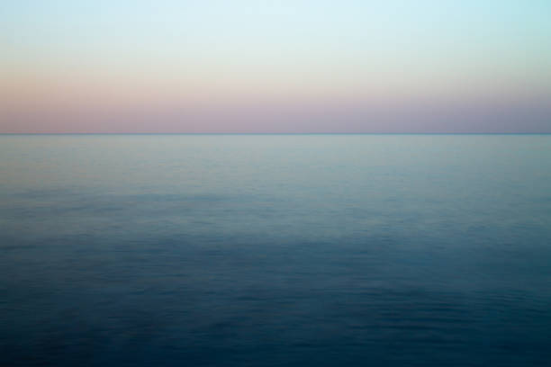 istock seascape at sunset as the background. long exposure 1057146592