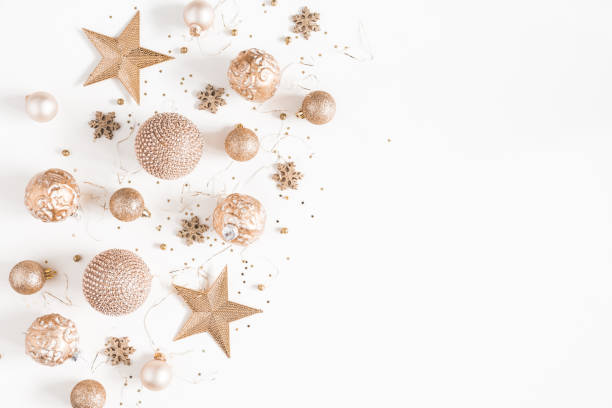 istock Christmas composition. Christmas golden decorations on white background. Flat lay, top view, copy space 1057149548