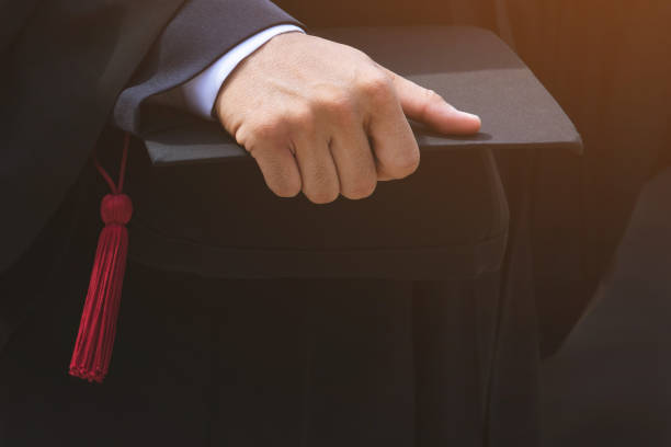 graduation,Student hold hats in hand during commencement success graduates of the university,Concept education congratulation.Graduation Ceremony,Congratulate the graduates in University. soft focus graduación, el estudiante sostener sombreros en la mano durante el egresados de éxito del comienzo de la universidad, felicitación de educación concepto. ceremonia de graduación, felicitar a los graduados en la universidad. enfoque suave