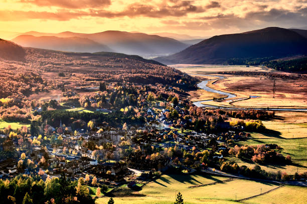 Cairngorms from Braemar village, Scotland View westwards along the Dee Valley above Braemar, Scotland. cairngorm mountains stock pictures, royalty-free photos & images
