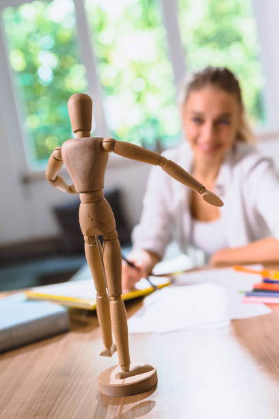 istock woman drawing with crayons 1057151240